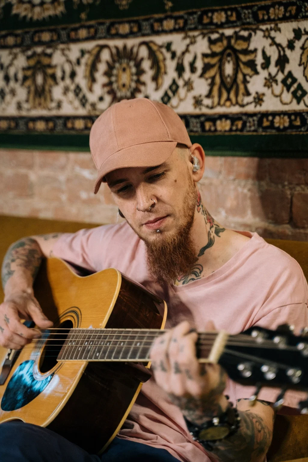 Professional musician performing on stage with HYPƐAR custom in-ear monitors (CIEM) - Swedish-made 3D-printed custom-fit stage monitors providing superior sound isolation, hearing protection from loud volumes, and clear sound reproduction for live performance